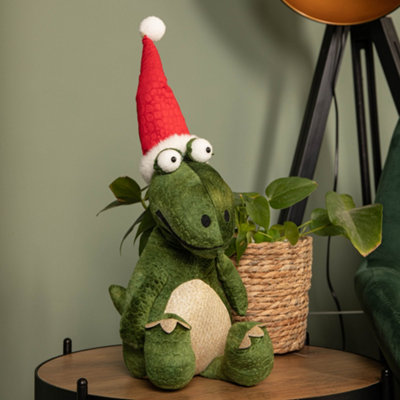 B&Q -  48Cm Green Sitting Christmas Dinosaur With Santa Hat