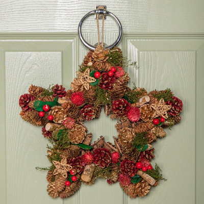 Samuel Alexander 35Cm Red Hanging Star Christmas Wreath With Red Berries And Pinecones from B&Q