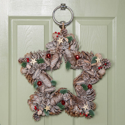 Samuel Alexander 45Cm Frosted Hanging Christmas Star Wreath With Red Jingle Bells & Wooden Stars from B&Q