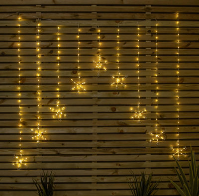 Samuel Alexander 1.2M X 1.2M Flexibrights Christmas Snowflake Curtain Lights With 267 Warm White Leds from B&Q