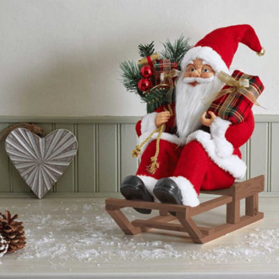 Samuel Alexander 30Cm Red And White Traditional Santa On Sleigh Christmas Decoration from B&Q