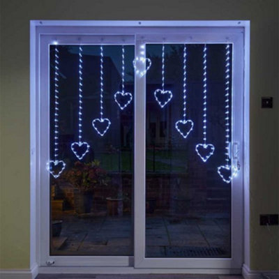 Samuel Alexander 1.2 X 1.2M Light Up Christmas Heart Curtain Lights With 229 Cool White Leds from B&Q