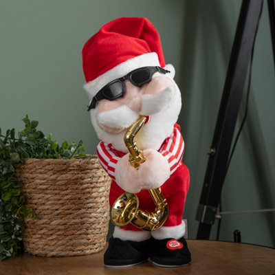 Samuel Alexander 35Cm Battery Powered Animated And Singing Santa With Saxophone Decoration from B&Q