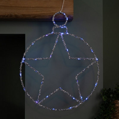 B&Q -  49Cm Battery Powered Light Up Christmas Silver Star Ball With Twinkling Blue Leds