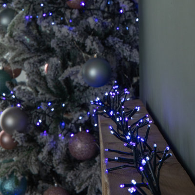Samuel Alexander 18.5M 1440 Led Christmas Cluster Multi-Action String Lights With Timer In BluePurple & White from B&Q
