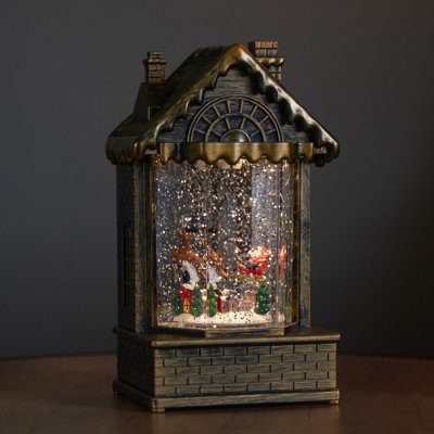 Samuel Alexander 20Cm Dual Powered Light Up Christmas House Water Spinner With Santa In Sleigh Scene And Leds from B&Q