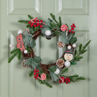 Samuel Alexander 40Cm Candy Swirls Christmas Wreath With Pinecones Red Berries And Candy Canes from B&Q