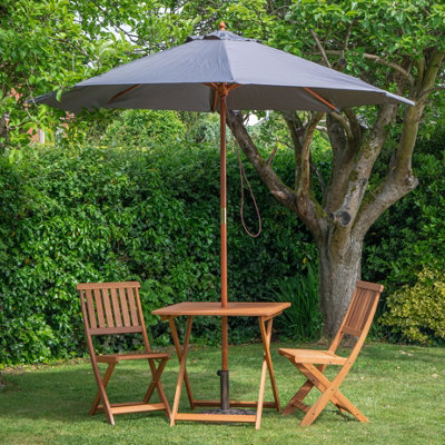 Samuel Alexander Outdoor 2 Person Folding Wooden Garden Dining Table Chairs Grey Parasol And Base Set from B&Q