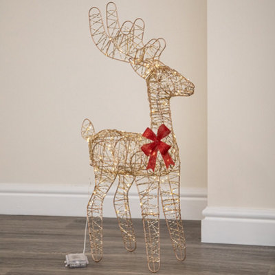 B&Q -  74Cm Battery Powered Light Up Gold Twist Christmas Standing Reindeer With 100 Warm White Leds