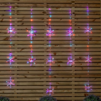 Samuel Alexander 1.3M X 1.2M Light Up Snowflake Christmas Curtain Lights With 390 Rainbow & Orange Twinkling Leds from B&Q