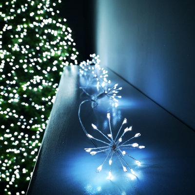 B&Q -  200 Led 10 Starburst Premier Christmas Outdoor Battery Timer Lights In Cool White