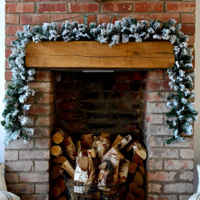 Samuel Alexander Premier 2.7M Snow Flocked Pine Christmas Garland With Glitter Finish from B&Q