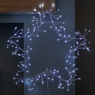 B&Q -  60Cm Light Up Silver Christmas Star Silhouette With Static & Flashing Ice White Leds