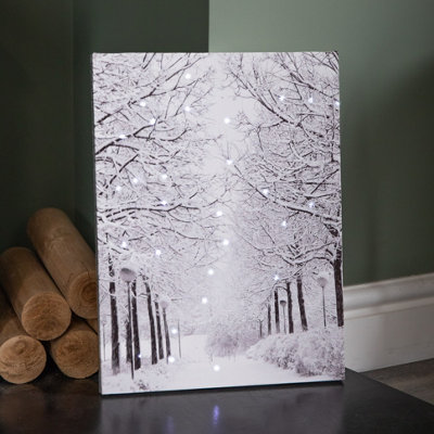 Samuel Alexander 40 X 30Cm Battery Operated Light Up Fibre Optic Winter Avenue Christmas Wall Canvas from B&Q