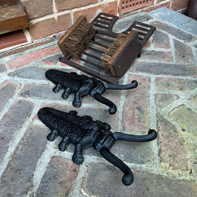 Selections Cast Iron Boot Jack And Scraper With A Pair Of Beetle Boot Jacks