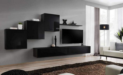 Arte Switch X Black Gloss Entertainment Unit For Tvs Up To 49 InchRefined Statement Wall With Push-Open Storage from B&Q