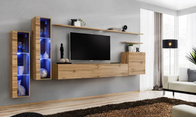 Arte Switch Xi Oak Wotan Entertainment Unit For Tvs Up To 75 InchWarm Wood Finish With Integrated Led Glass Displays from B&Q
