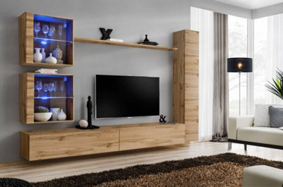 Arte Switch Xviii Oak Wotan Entertainment Unit For Tvs Up To 75 InchWarm Wood Wall System With Led Highlights from B&Q