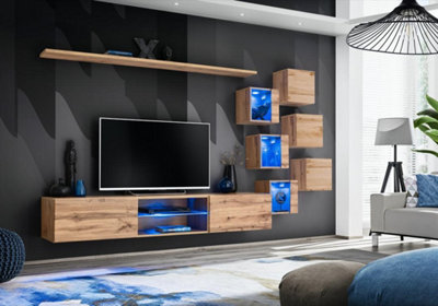 Arte Switch Xxi Oak Wotan Wall Entertainment Unit For Tvs Up To 75 Inch Warm Wood Finish With Led Display Highlights from B&Q