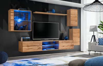 Arte Switch Xxiii Oak Wotan Wall Entertainment Unit For Tvs Up To 75 InchWarm Modern Style With Blue Led Display from B&Q