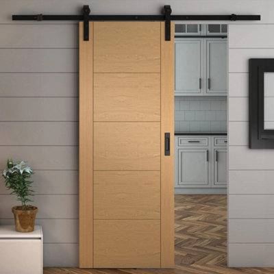 Green & Taylor Oak Ladder FlushPrefinished Internal Sliding Barn Door from B&Q