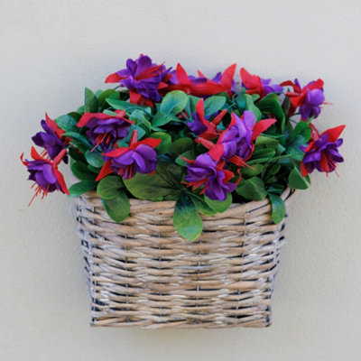 Primrose Artificial Fuchsia Wall Floral Arrangement In Wicker Basket 38Cm from B&Q