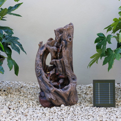 Primrose Solar Power Water Feature Brown Tree Bark Design With White Leds 60Cm from B&Q