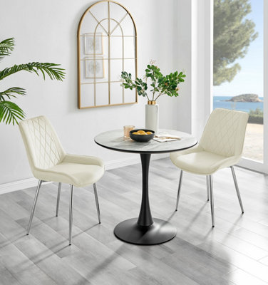 B&Q -  Elina White Marble Effect Round Pedestal Dining Table With Curved Black Support And 2 Cream Velvet Pesaro Silver Leg Chairs
