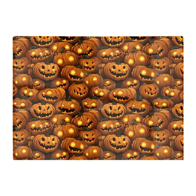 Warren Reed Designer Grinning Lanterns Pumpkins Glass Chopping Board from B&Q