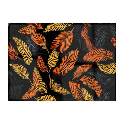 B&Q -  Orange Feather Leaves Glass Chopping Board