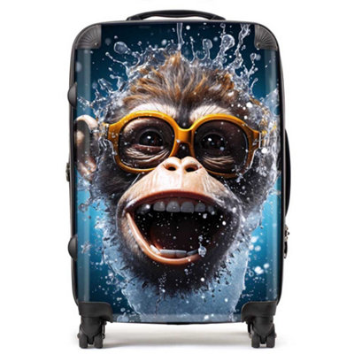 Warren Reed Designer Splashart Cheeky Chimp Face SuitcaseMedium from B&Q