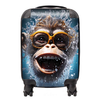 Warren Reed Designer Splashart Cheeky Chimp Face SuitcaseMini Cabin from B&Q
