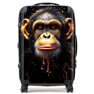 Warren Reed Designer Splashart Cheeky Chimp Face SuitcaseMedium from B&Q