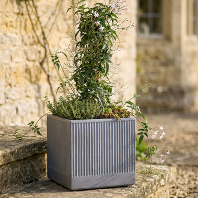 Dibor Small Slate Grey Ribbed Finish Fibre Clay Indoor Outdoor Garden Plant Pots Houseplant Flower Planter H25 X W25Cm from B&Q