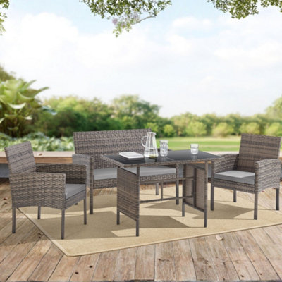 Evre Brown Porto 4 Seater Rattan Garden Furniture SetTable & Chairs With Sofa & Glass TableInc Weekend Delivery from B&Q