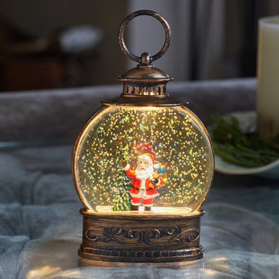 Marco Paul Led Christmas Snow Globe Lantern With Santa from B&Q