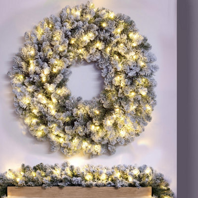 Christmas Tree World 120Cm Pre-Lit Flocked Extra Thick Arbor Vitae Wreath from B&Q