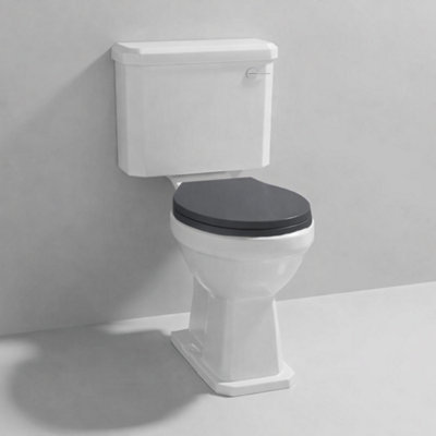 Aquarius Harewood Traditional Close Coupled Toilet With Black Wooden Soft Close Seat from B&Q