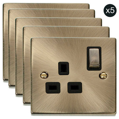 B&Q - 5 PackAntique Brass 1 Gang 13A Dp Ingot Switched Plug SocketBlack TrimSe Home