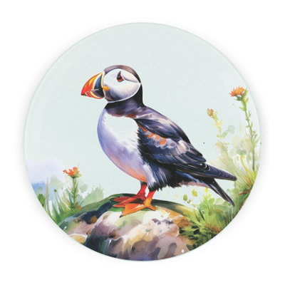 Purely Home Coastal Puffin Round Worktop ProtectorTextured Glass Chopping Board from B&Q