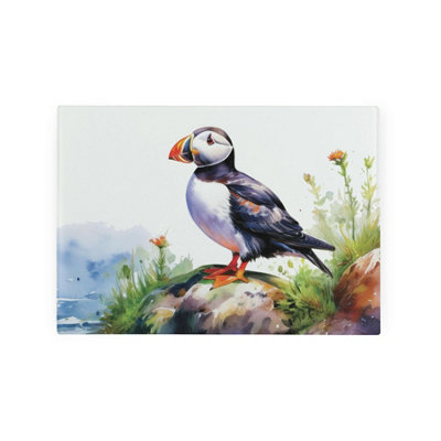 Purely Home Coastal Puffins Smooth Glass Worktop SaverSmall Chopping Board from B&Q