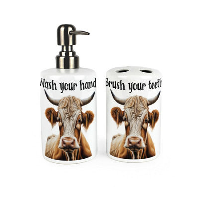 Purely Home Highland Cow Bathroom SetRefillable Ceramic Soap Dispenser & Toothbrush Holder from B&Q