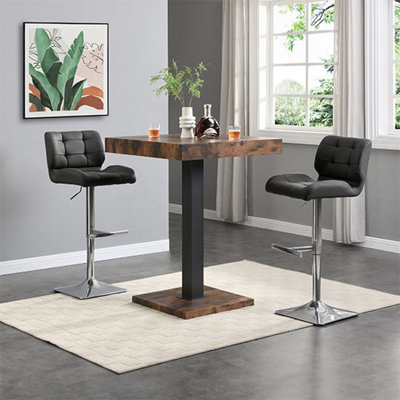 Furniture in Fashion Topaz Rustic Oak Wooden Bar Table With 2 Candid Black Stools from B&Q