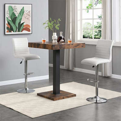 Furniture in Fashion Topaz Rustic Oak Wooden Bar Table With 2 Ripple White Stools from B&Q