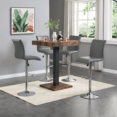 Furniture In Fashion Topaz Rustic Oak Wooden Bar Table With 4 Ripple Grey Stools from B&Q