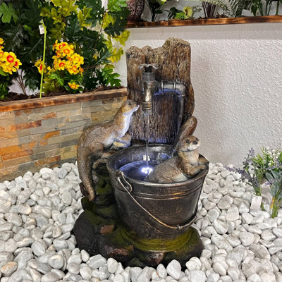 Outdoor Living UK Otters At Tap Animal Animal Fountain Water Feature With Cover from B&Q