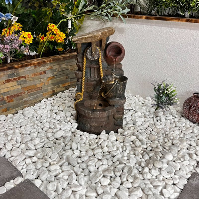 Outdoor Living UK Solar Rustic Jug Traditional Water Feature With Cover from B&Q