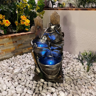 Outdoor Living UK Metal Pouring Jugs Traditional Water Feature With Cover from B&Q