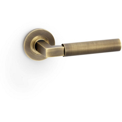 B&Q -  Solid Brass Smooth Door Handle SetAntique Brass Angled Lever On Round Rose