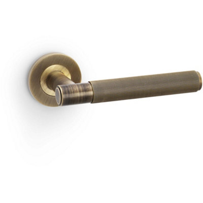 B&Q -  Solid Brass Reeded Door Handle SetAntique Brass Straight Lever On Round Rose